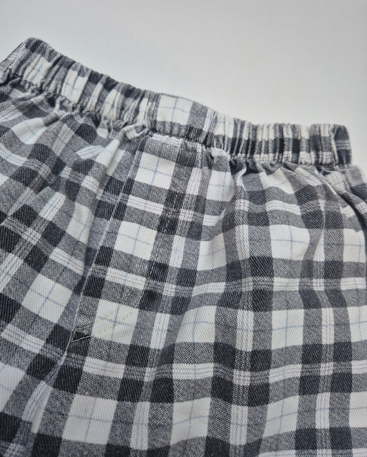 Zwart-wit geruite broek met zak – maat 104 | 3 -4 jaar