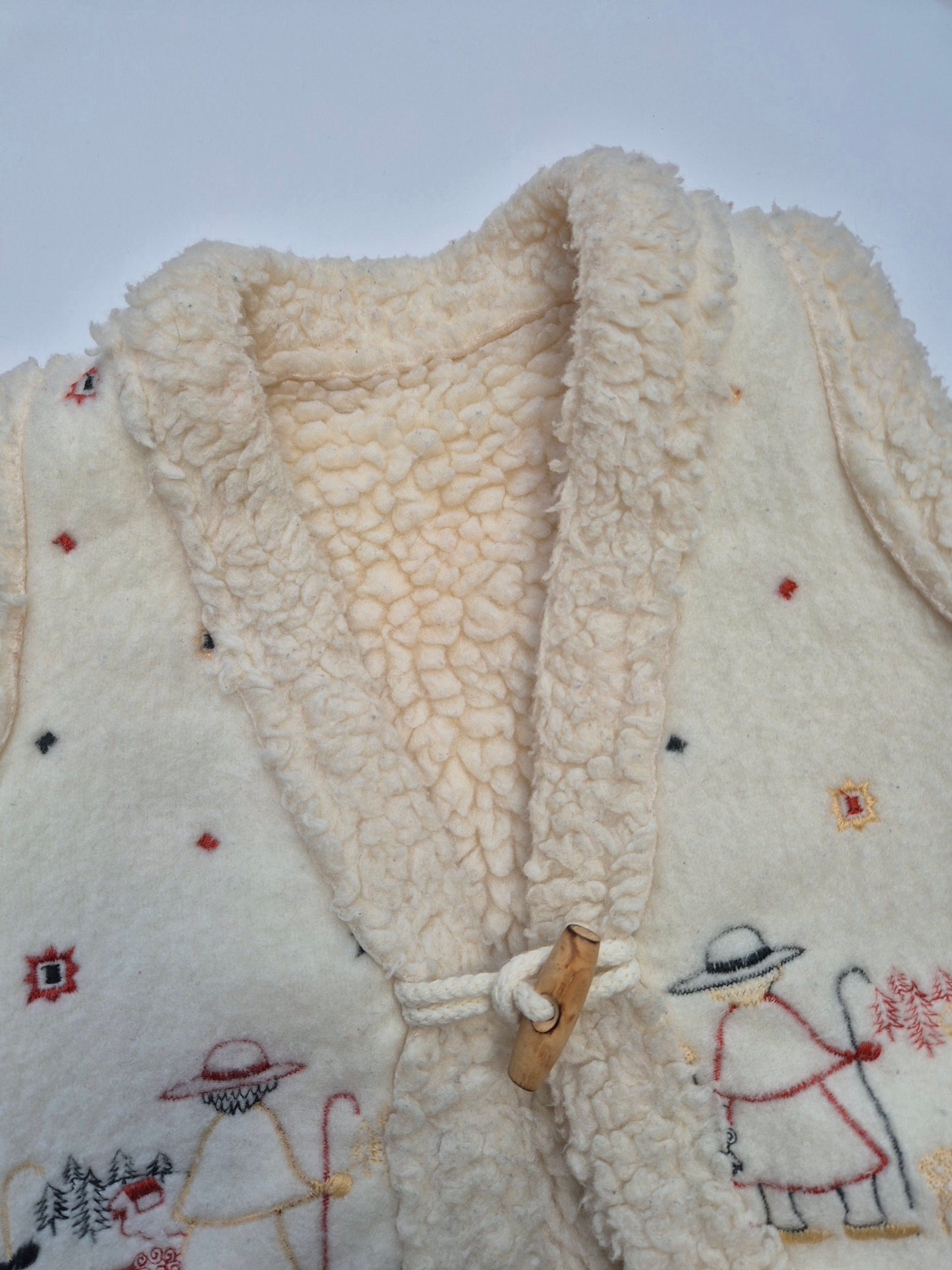 Wollen bodywarmer met borduursel – maat 80 | 9 - 12 maanden