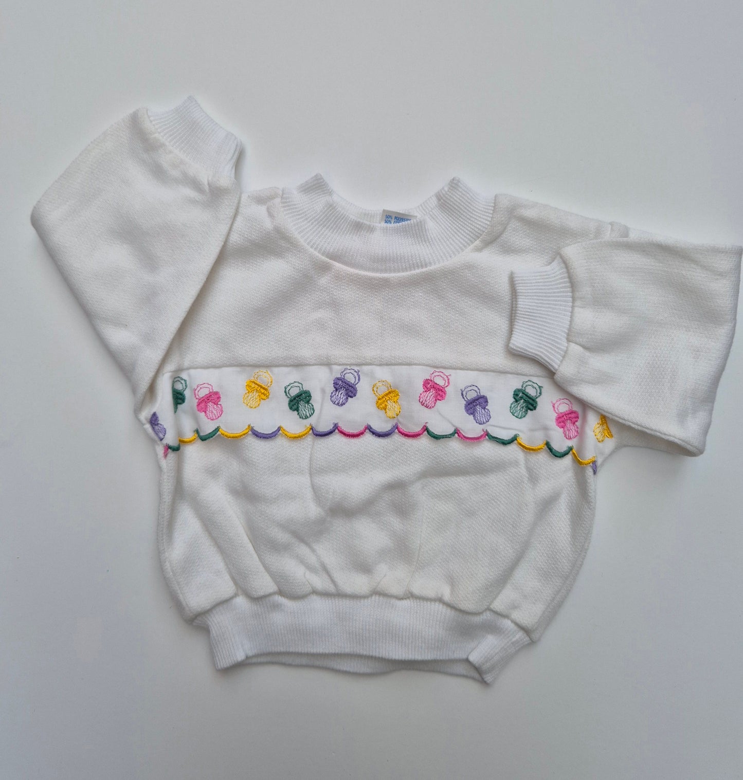 Witte sweater met geborduurde figuurtjes – maat 68 | 3 - 6 maanden
