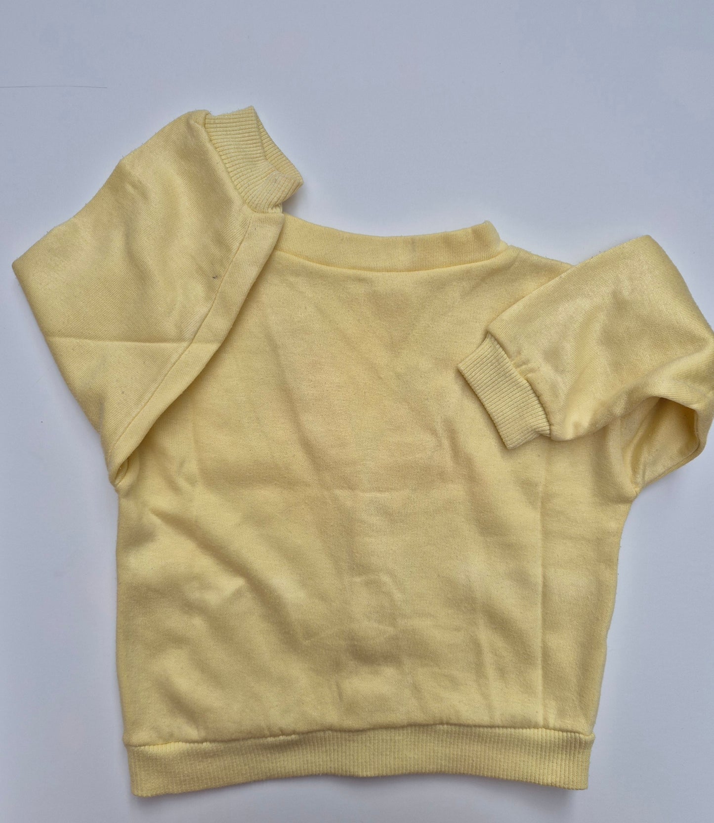 Zachtgeel vest met drukknoopjes – maat 92 | 18 - 24 maanden