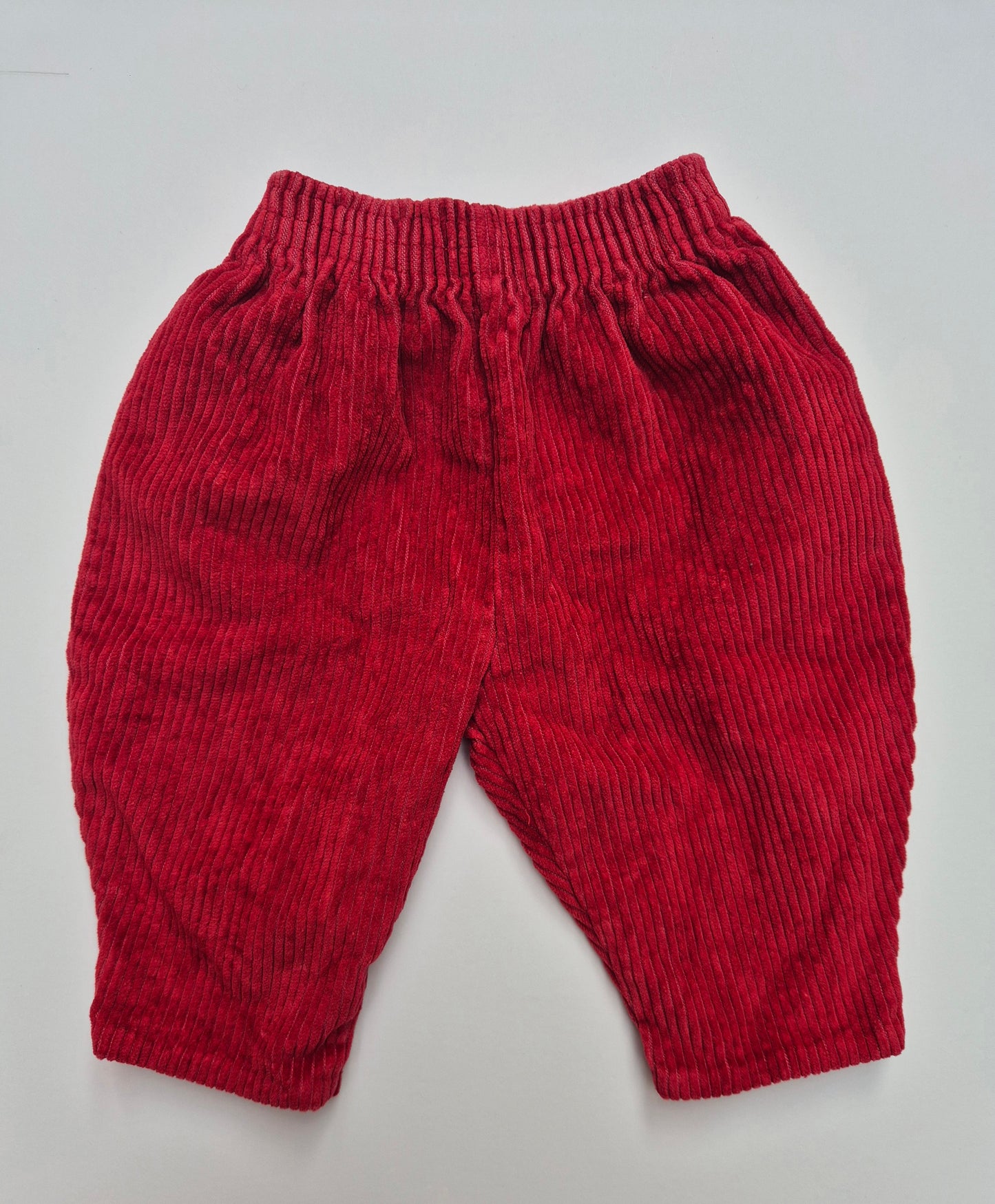 Rode corduroy broek – maat 62 | 2 - 3 maanden