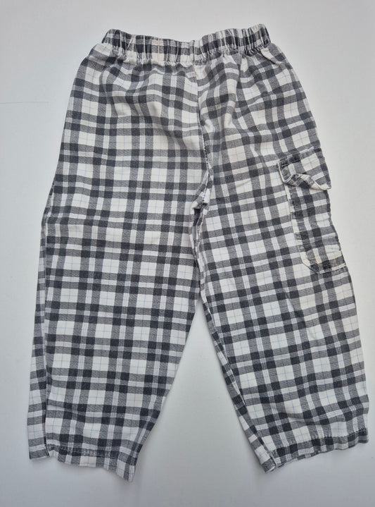 Zwart-wit geruite broek met zak – maat 104 | 3 -4 jaar