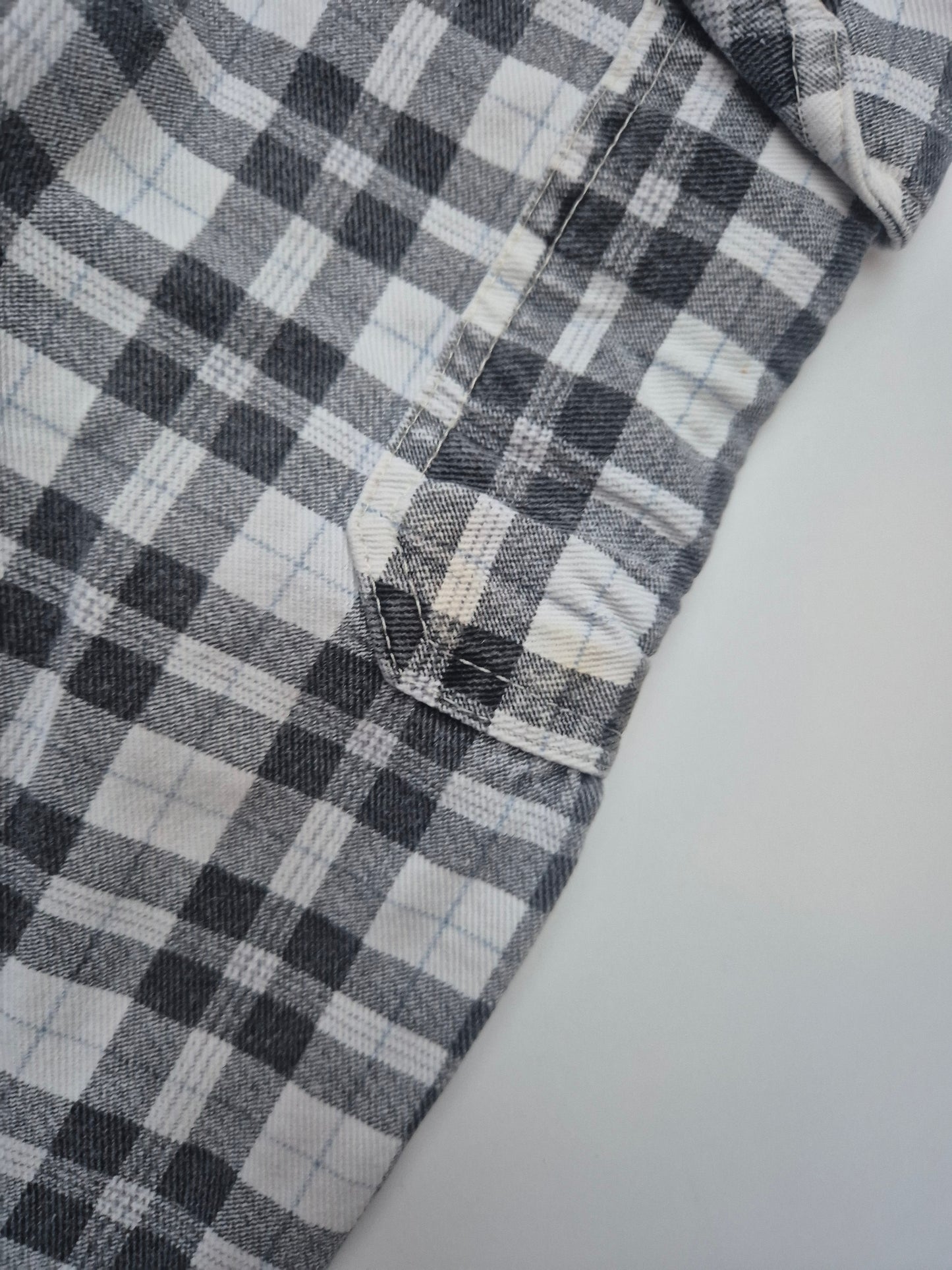 Zwart-wit geruite broek met zak – maat 104 | 3 -4 jaar